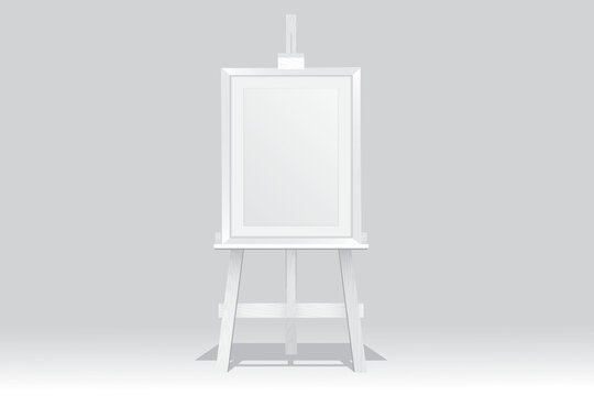 Wooden Easel Stand With Picture Frame On White Background