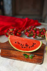Red fresh watermelon on the wood