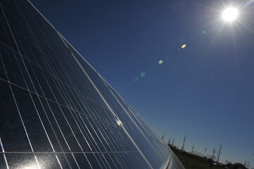 Zhambyl region, Kazakhstan - 05.15.2013 : The glare of sunlight falls on the blue plates of the...