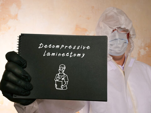 Medical concept meaning Decompressive laminectomy with phrase on the piece of paper.
