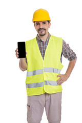 Builder in uniform standing with smartphone on white background