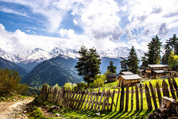 Fototapeta na wymiar landscape with fence in mountains