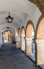 arched hallway in the Plaza de Espana in Zafra