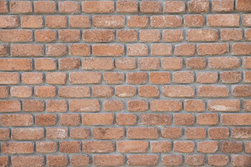 Fototapeta premium brown wall made of brick with rounded edges