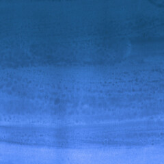 Colorful ink and watercolor texture on white paper background. Gradient paint strokes and decalcomania effect. Hand-painted gouache abstract image. Mess on the canvas.
