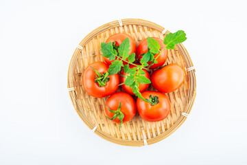 Fresh tomatoes on white background