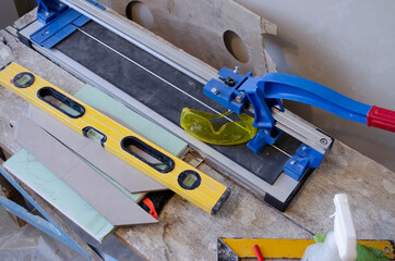 tile cutter and levels. Lifestyle Tiling Tools