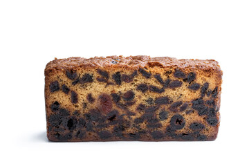 Rich dark fruit cake isolated on white