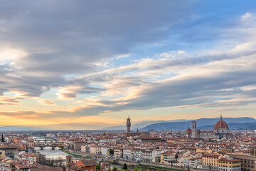 Beautiful sunset over Florence with landmarks. Palazzo Vecchio, Florence Cathedral, Ponte Vecchio. Tuscany, Italy