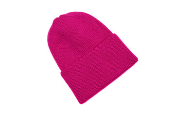 Pink knitted beanie hat isolated on white background.