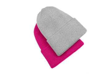 Two beanie hats isolated on white background.
