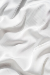 beautiful silk fabric of delicate white color draped with small folds, softly flowing,
