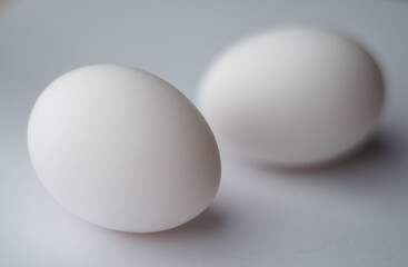 two eggs, one out of focus