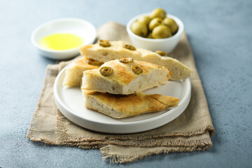 Traditional homemade focaccia bread with olives