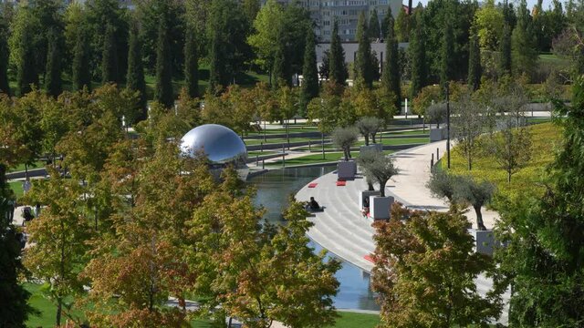 City Park "Krasnodar". Galician park. Artificial river. Art object, sculpture "Geolocation" or "Inverted Drop". Recycle group. Andrey Blokhin, Georgy Kuznetsov. Krasnodar, Russia. Sunny day. Fall.