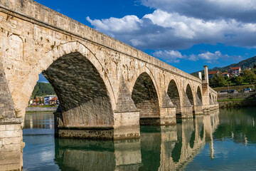 Fototapeta premium old stone arch bridge