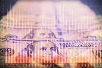 Double exposure of forex graph drawing over us dollars bill background. Concept of financial...