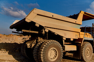 Fototapeta premium bulldozer sand construction work outdoors blue sky