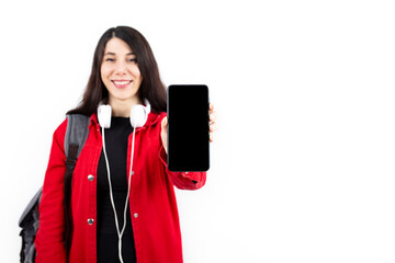 Naklejka premium Young student woman showing a mobile phone to the camera. 