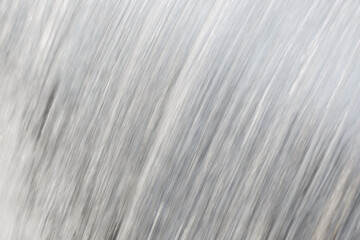 Close up blurry waterfall stream. Shoot by slow speed shutter.