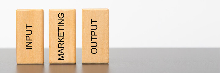marketing, input and output printed on wooden cubes