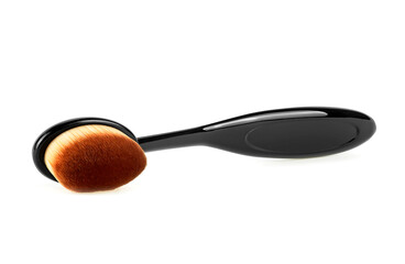 Black cosmetic make-up brush isolated on a white background. Foundation brush. Export concealer brush.