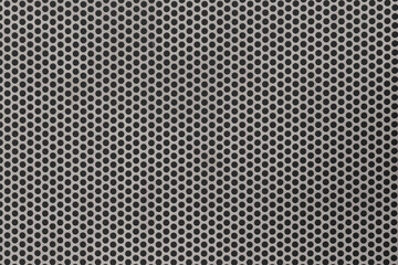 Circular perforated stainless steel sheet.