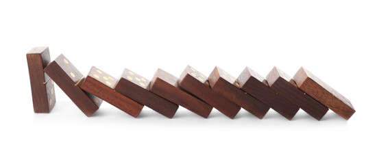 Wooden domino tiles falling on white background