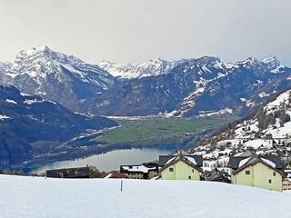 View of the settlement of Amden above the Lake Walen or Lake Walenstadt (Walensee) and the fertile...