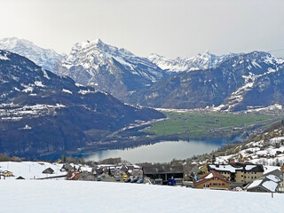 View of the settlement of Amden above the Lake Walen or Lake Walenstadt (Walensee) and the fertile...