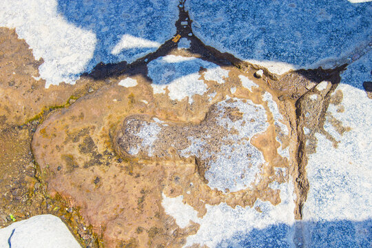 A stone penis carved on the street of Pompeii, pointing the way to the brothel, Campania, Italy. Roman city of Pompeii, buried under ashes after eruption of Vesuvius. UNESCO World Heritage Site