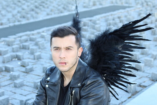 Urban angel with black wings 