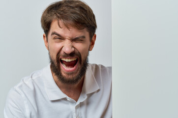 Fototapeta premium bearded man emotions white mockup advertisement presentation studio