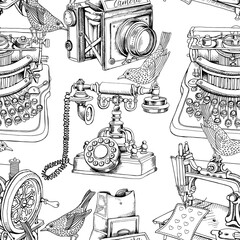 Obraz premium Seamless pattern with image of a Vintage Camera, Telephone, Typewriter, Sewing machine and a birds. Vector black and white illustration.