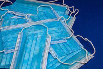 Close up and detail of medical hygienic mask, face protective surgical masks isolated.