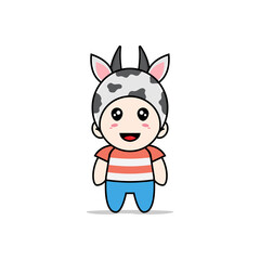 Obraz premium Cute boy character wearing cow costume.