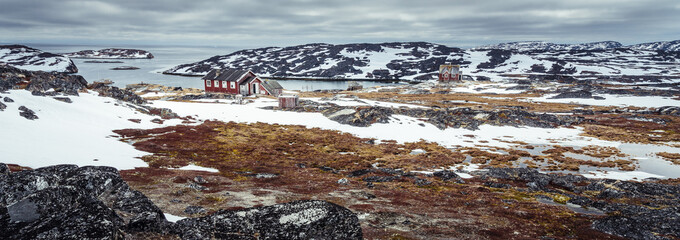Abandoned village of Kitsigsut, on an island at Disko Bay, Greenland during winter