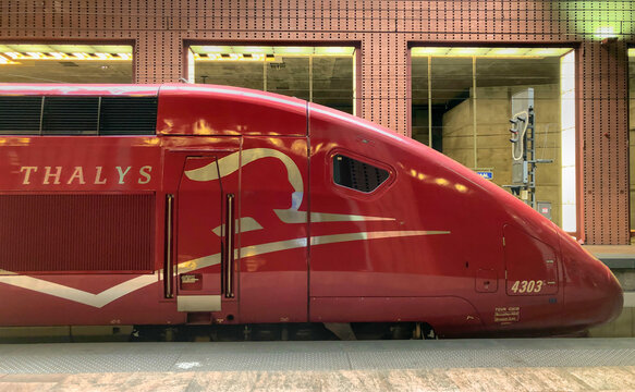 Antwerp, Belgium - June 2019: People boarding the Paris bound Thalys high speed train tgv from Antwerp Central train station, Antwerp, Belgium Europe