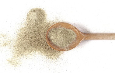 Milled white pepper powder pile, peppercorn with wooden spoon isolated on white background, top view