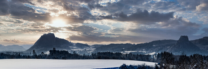 Panorama of the Hegau mountains at sunset on a winter day