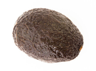 Fototapeta premium ripe dark avocado on white background