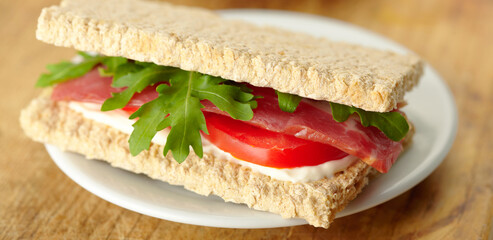 Homemade sandwich with bacon