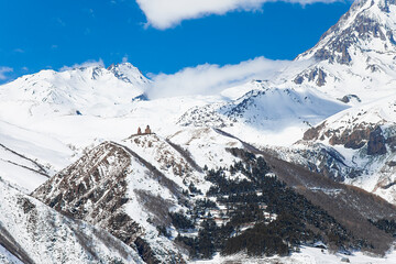 Kazbegi Mountain Winter View with Blue Sky