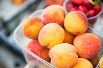Ripe organic peaches for sale in market
