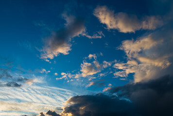 Beautiful sunset. Orange and black clouds in the sky