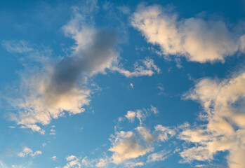 beautiful clouds in the blue sky during sunset time