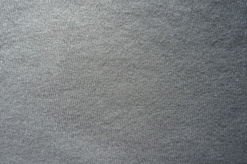 Fototapeta na wymiar Top view of simple gray cotton jersey fabric