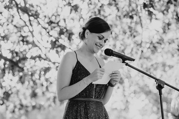 Young woman reading a speech