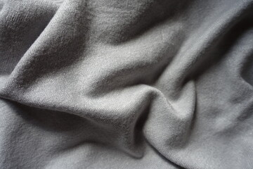 Gray jersey cotton fabric in soft folds