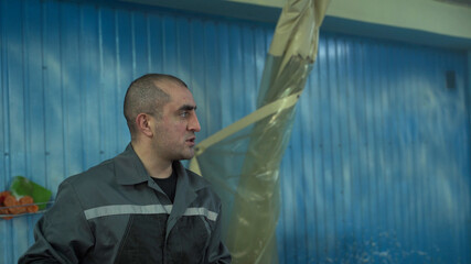 Portrait of male worker of Caucasian nationality close-up.